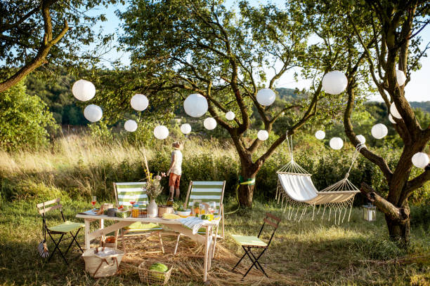 istock Beautifully decorated yard with dinner place 1166582880