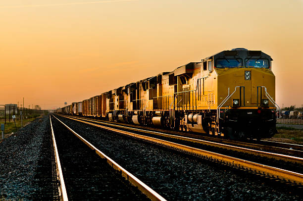 Railroad locomotive travelling across Arizona Railroad locomotive traveling across Arizona locomotive stock pictures, royalty-free photos & images