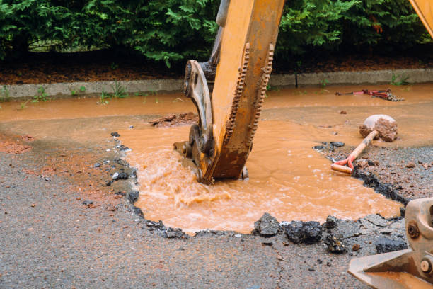 istock Repair the broken pipe for domestic on the mud ground. 1166585625