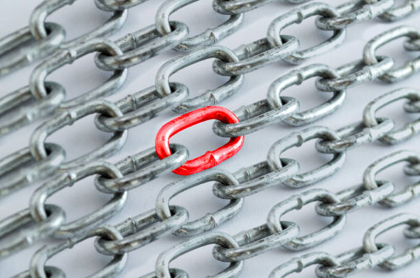 istock background of chains with colors and reflections. 1166585636