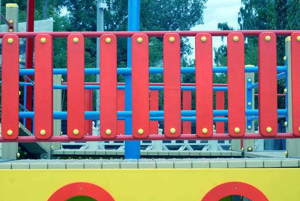 istock colored structure in a playground with a red decorative fence 1166585697