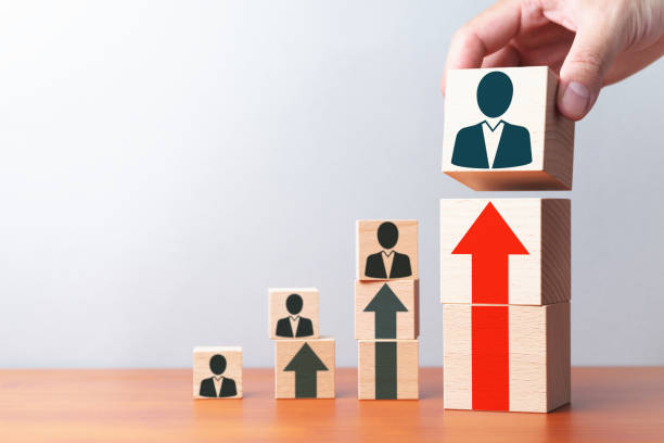 Business personal development. Growth arrows and businessperson icons. stock photo