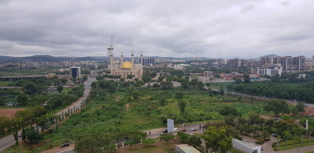 Abuja city with Mosque Aerial view of the Abuja city, federal capital city, Nigeria. abuja stock pictures, royalty-free photos & images