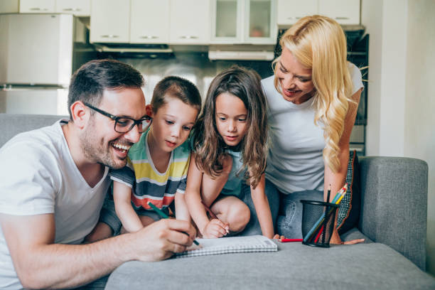istock Young happy family drawing 1166588710