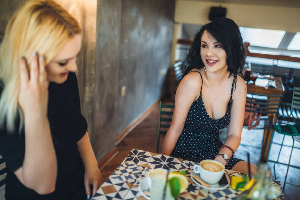 istock Two young women in cafe 1166593796