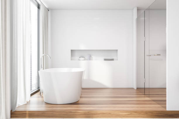 istock White bathroom interior, tub and shower 1166598042