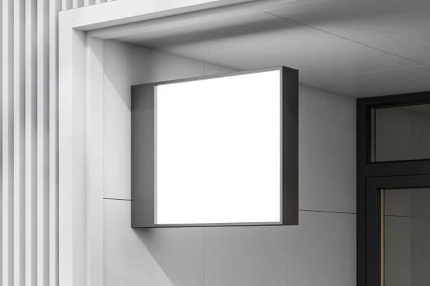 istock Square mock up poster on white building wall 1166598502