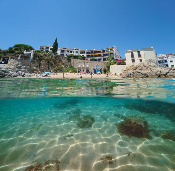 istock Spain beach in Calella de Palafrugell over under 1166599235