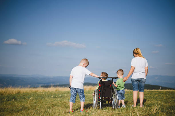 istock Mother and sons in nature 1166599621
