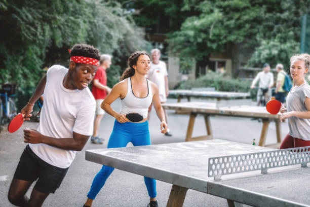 istock young people playing table tennis round around 1166599719