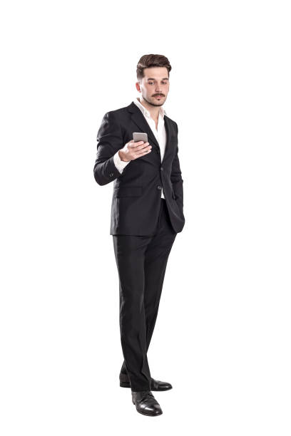 istock Calm bearded businessman with phone 1166600674