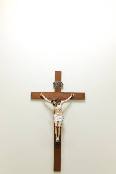 istock statue with image of crucified Jesus 1166600986
