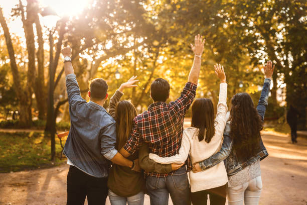 istock Group of friends in the park 1166601172