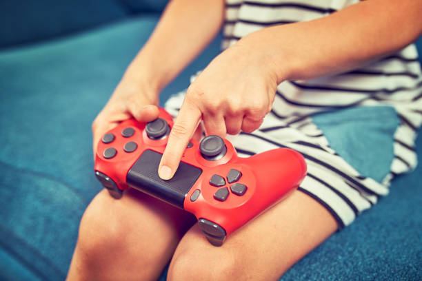 istock Video gamer plays with a joystick in the game 1166601329