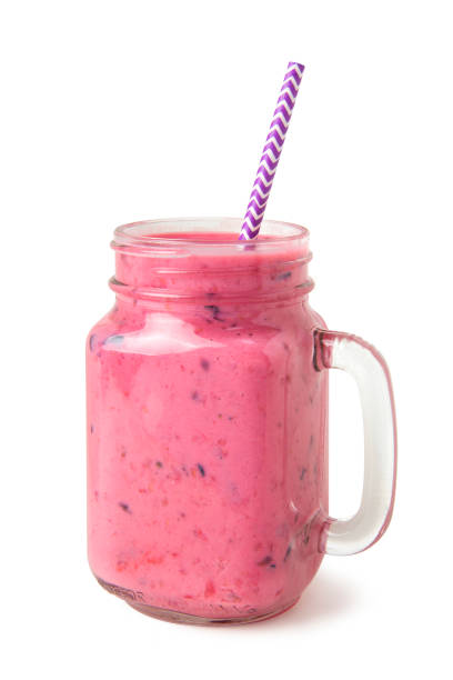 istock Fresh berry mix smoothie in a glass jar on a white background isolated 1166603340