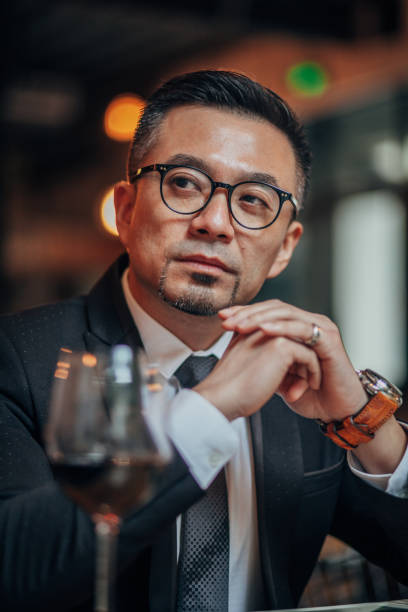 istock Handsome businessman sitting in restaurant 1166603558