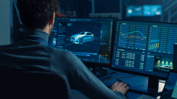 istock Professional Automotive Graphic Designer is Working on 3D CAD Software Rendering Electric Concept Car and Calculating its Efficiency in a High Tech Innovative Laboratory with a Prototype. 1166604623