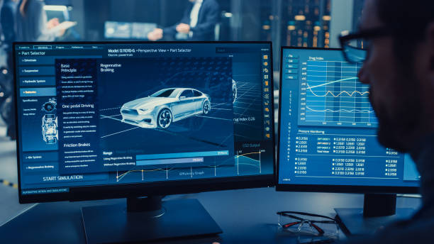 istock Professional Engineer Works on a Computer with a 3D CAD Software and Tests the Electric Car Chassis Prototype with Wheels, Batteries and Engine Standing in a High Tech Development Laboratory. 1166605189