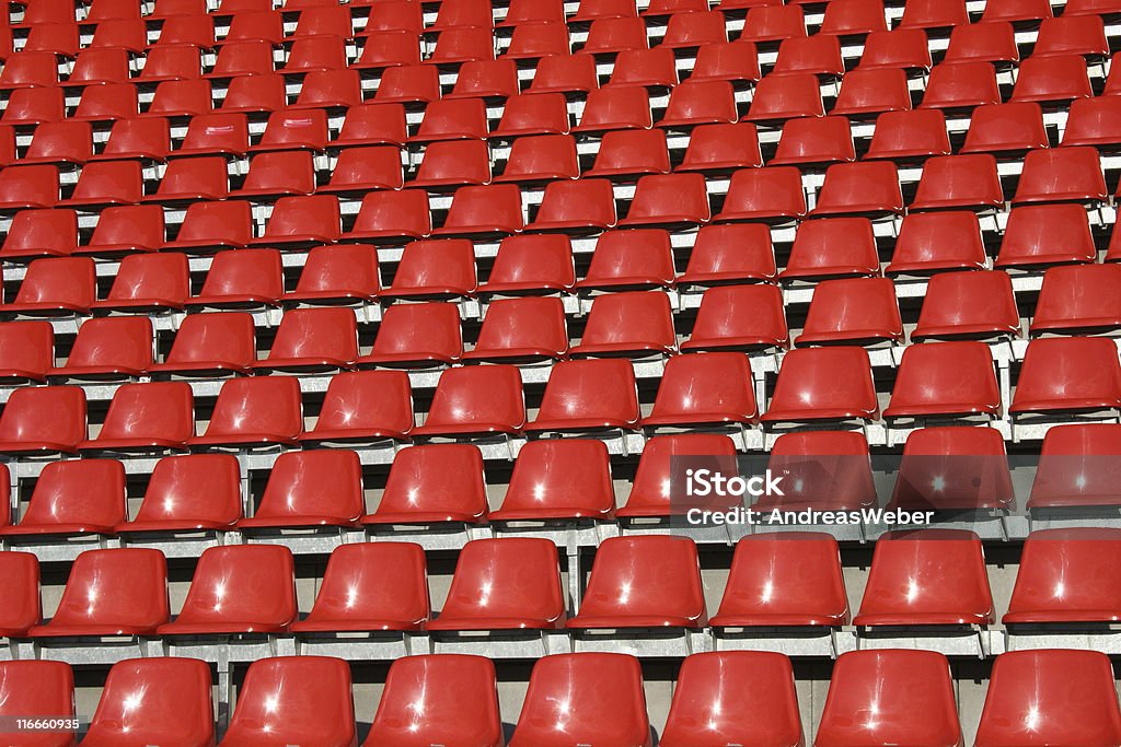 Red seats in a stadium Horseracing Track Stock Photo