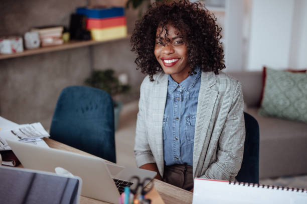 istock Strong woman leading her team to success 1166609892