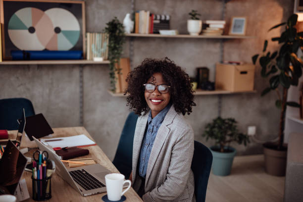 istock Strong woman leading her team to success 1166609973