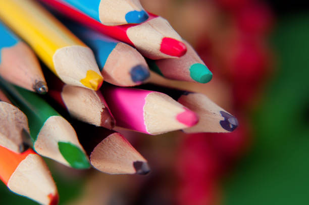 istock A set of colored sharpened pencils for drawing on a colored background close-up 1166613398