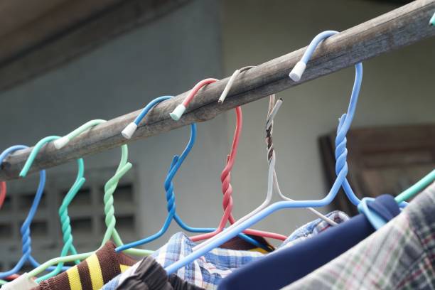 istock colorful hangers on bamboo pole 1166613434