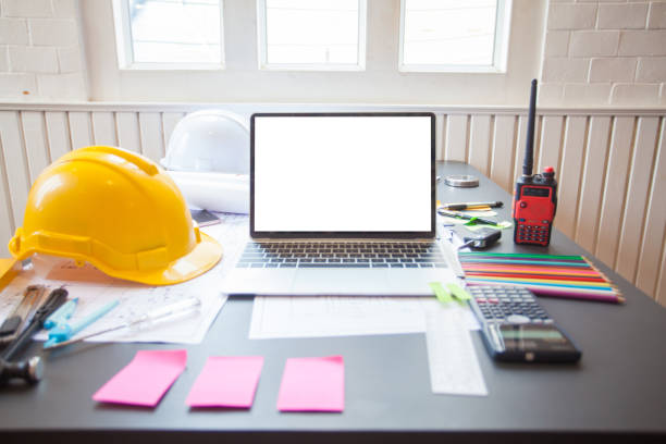 istock Concept Architect and desk of Architectural project in construction site or office building with mining light 1166613465