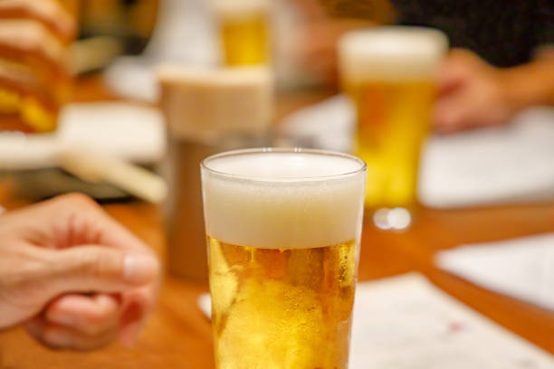 istock Cheers scene at a drinking party 1166613612