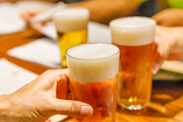istock Cheers scene at a drinking party 1166613726