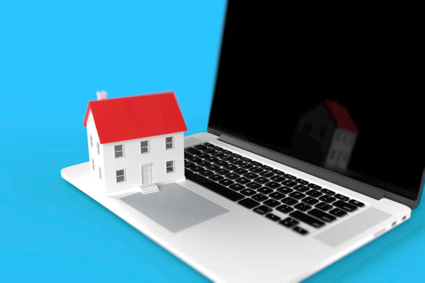 istock 3d rendering house on a keyboard stock photo 1166615631