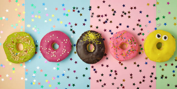 istock five round donuts with various fillings and sprinkles 1166617282