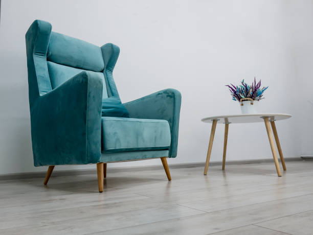 istock elegant green armchair and coffee table 1166617589
