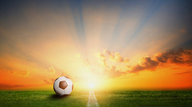 istock Soccer ball with Sunset background. 1166618785