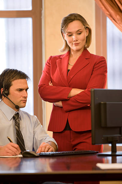 istock Man And Woman Working Together 116661996