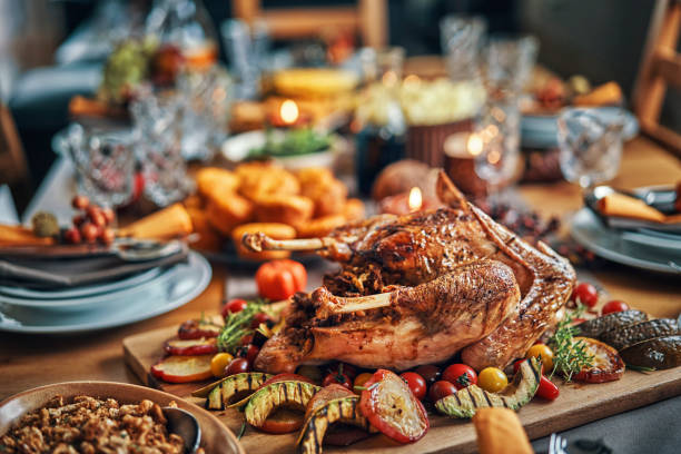 istock Family Having Traditional Holiday Stuffed Turkey Dinner 1166620732