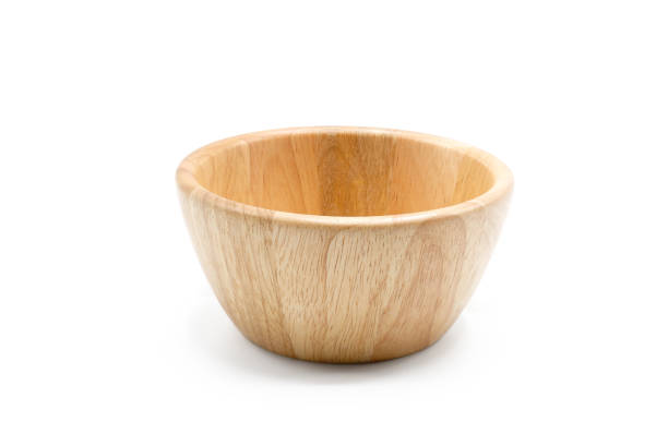 istock Empty round wooden bowl, isolated on white background. 1166620945