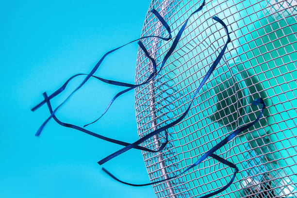 istock Working air fan with blue ribbons on white background. 1166621563