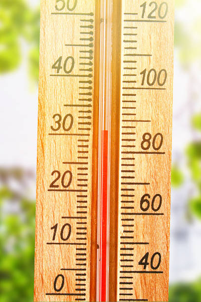 istock Thermometer displaying high 30 degree hot temperatures in sun summer day. 1166622087