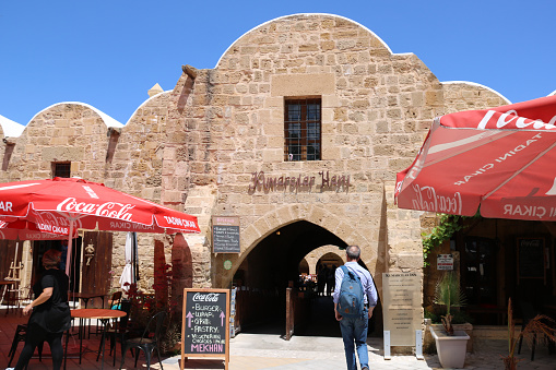 Turkish Cyprus - May 8, 2019: kumarcilar Inn in Nicosia is an ex caravanserai realized in 1700 with typical architectural style apt to host the caravans that passed