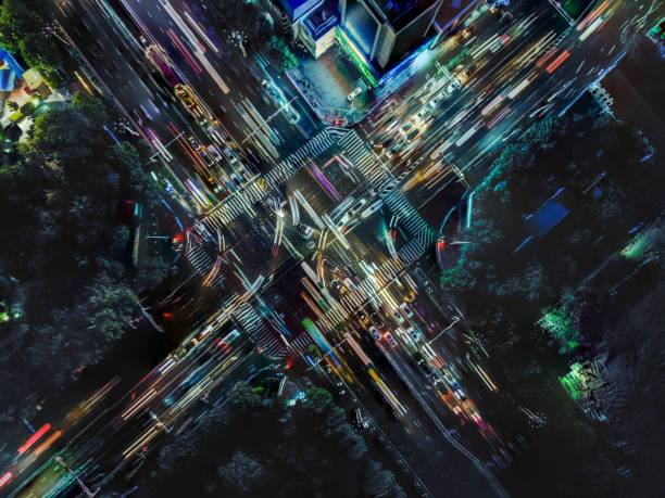 Drone Point View of City Street Crossing at Rush Hour Drone Point View of City Street Crossing at Rush Hour crossing photos stock pictures, royalty-free photos & images