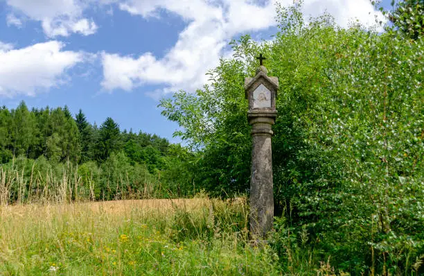 Photo of old stony piety column