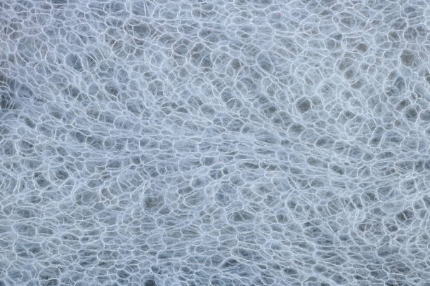 istock Homemade knitted warm woolen  soft  blue   female  wrap  texture 1166626660