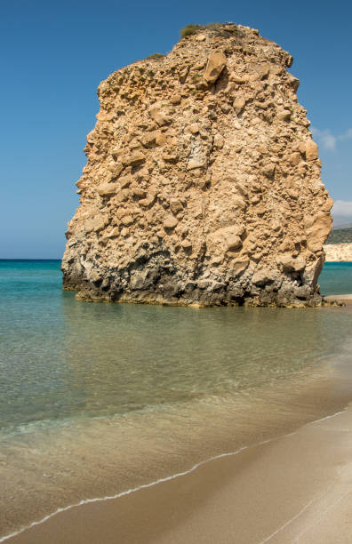 istock big rock looking from sea, Milos 1166627394