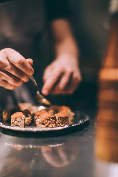 istock Chef At Work, Preparing A Plate Of Bread And Cheese 1166631078