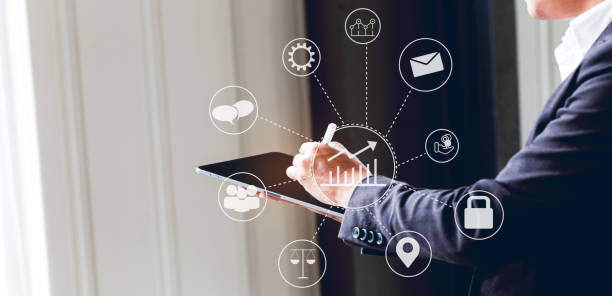 istock Asian business man using digital tablet in office to operate the network, e commerce online at the office, The media reaches the operational guidelines, for panoramic banner background with copy space 1166632893