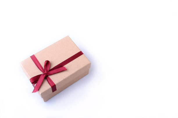 istock Gift boxes with bow on wood background. Christmas Decoration 1166634870