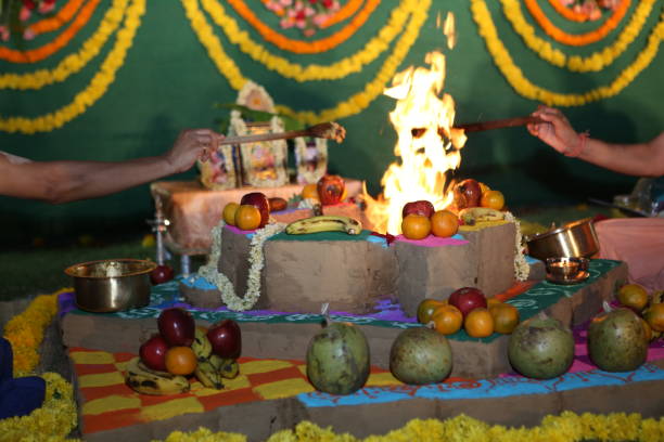 istock Offering prayers to God in front of fire 1166636368
