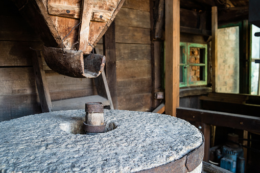 very ancient grinding wheel to grind the grain used by the ancient inhabitants of Northern Italy