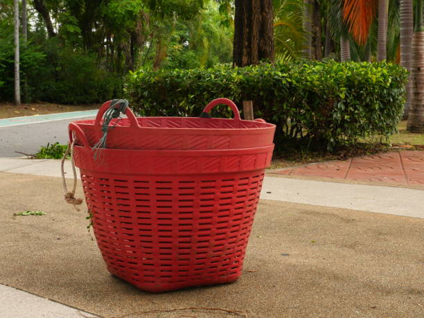 istock red plastic basket in the garden 1166637834